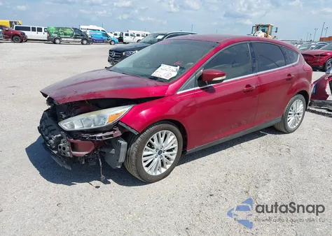 2016 Ford Focus Titanium z USA, uszkodzony, nr VIN 1FADP3N27GL256143